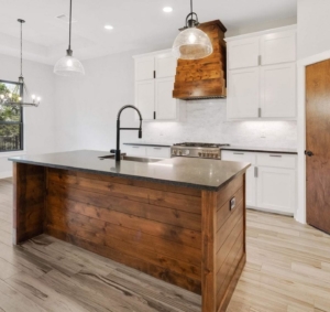 Modern kitchen featuring Black Pearl honed granite countertops in Austin, TX